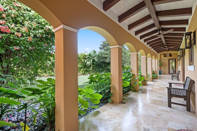 view of patio with ceiling fan