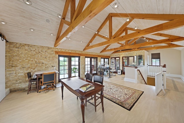 living room with high vaulted ceiling, wooden ceiling, beam ceiling, and french doors