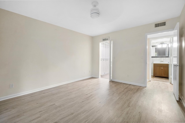 empty room featuring light hardwood / wood-style floors