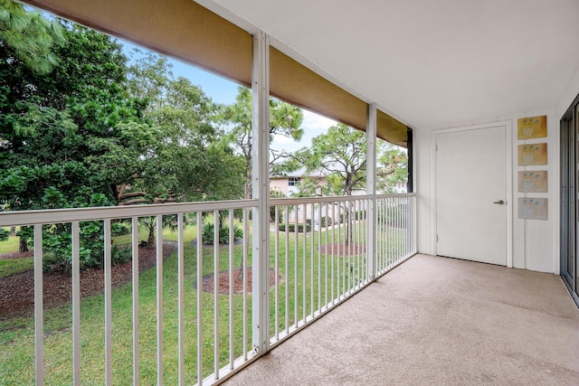 unfurnished sunroom with a wealth of natural light