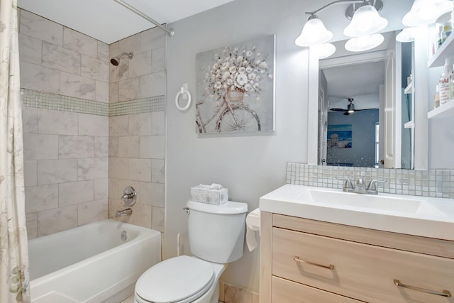 full bathroom featuring tasteful backsplash, vanity, toilet, and shower / bath combination with curtain