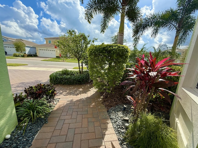 view of yard with a garage