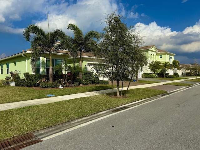 view of front of house with a front lawn