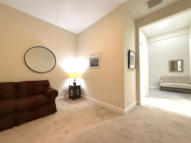 sitting room with light carpet