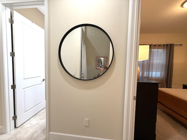 interior space featuring a textured ceiling