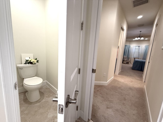 bathroom featuring toilet