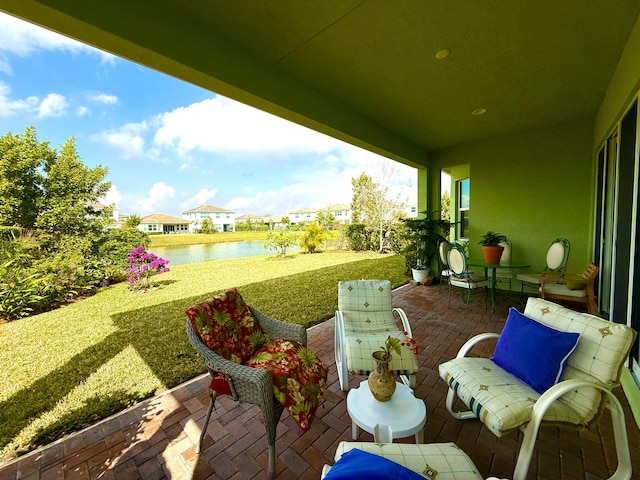 view of patio / terrace with a water view