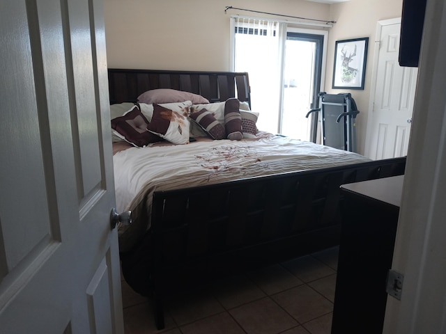 5266 Greenwood Dr, Delray Beach, FL 33484 - bedroom featuring dark tile patterned flooring