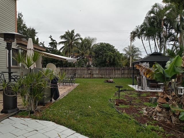 5266 Greenwood Dr, Delray Beach, FL 33484 - view of yard with a patio area