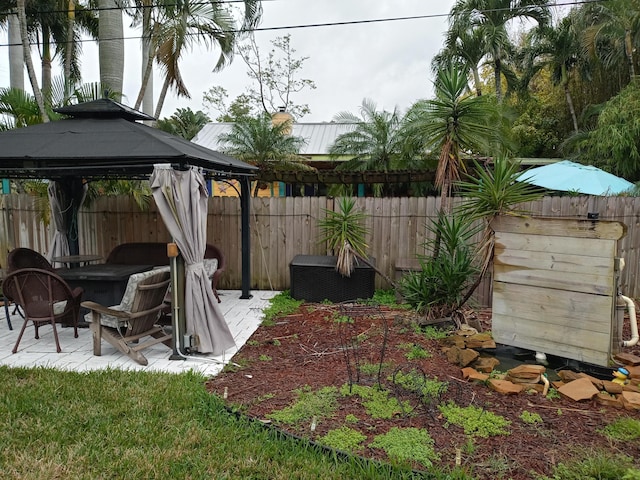 5266 Greenwood Dr, Delray Beach, FL 33484 - fenced backyard with a gazebo and a patio area