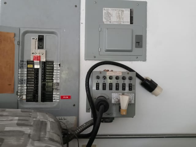 utility room featuring electric panel