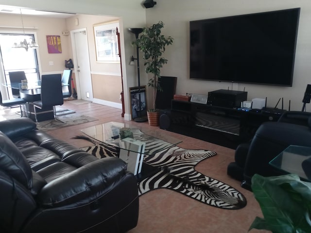 5266 Greenwood Dr, Delray Beach, FL 33484 - living room with a chandelier and baseboards