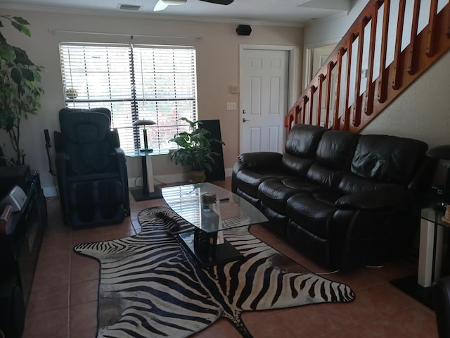 5266 Greenwood Dr, Delray Beach, FL 33484 - living area featuring tile patterned flooring, ornamental molding, and a ceiling fan