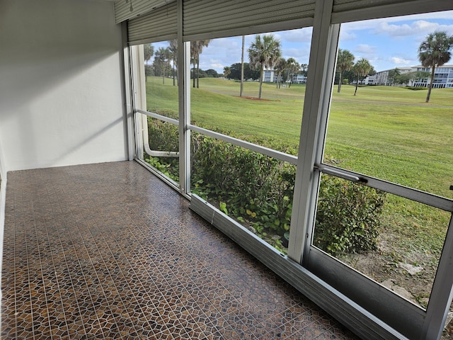 unfurnished sunroom featuring plenty of natural light