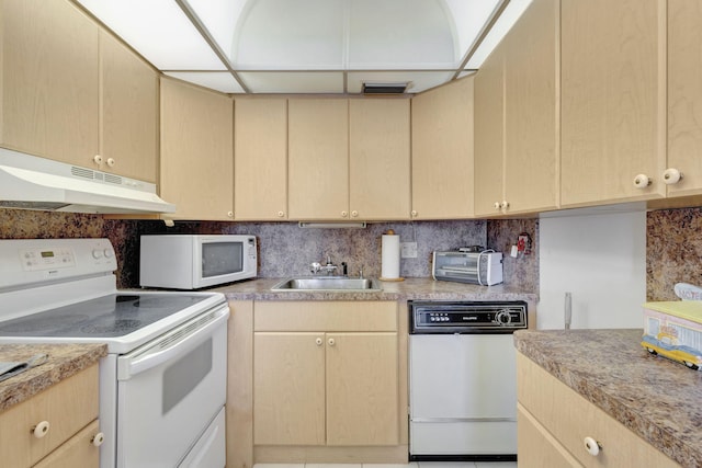 kitchen with light brown cabinetry, sink, white appliances, and decorative backsplash