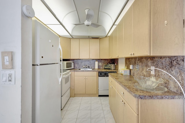 kitchen featuring ceiling fan, light brown cabinets, white appliances, light tile patterned flooring, and sink