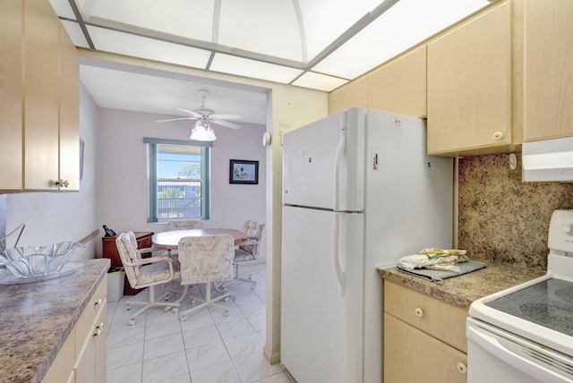 kitchen with tasteful backsplash, ceiling fan, white appliances, light brown cabinets, and ventilation hood