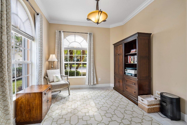 sitting room with light tile patterned floors and ornamental molding