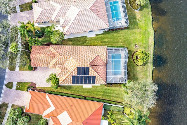 bird's eye view with a water view