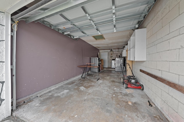 garage featuring separate washer and dryer