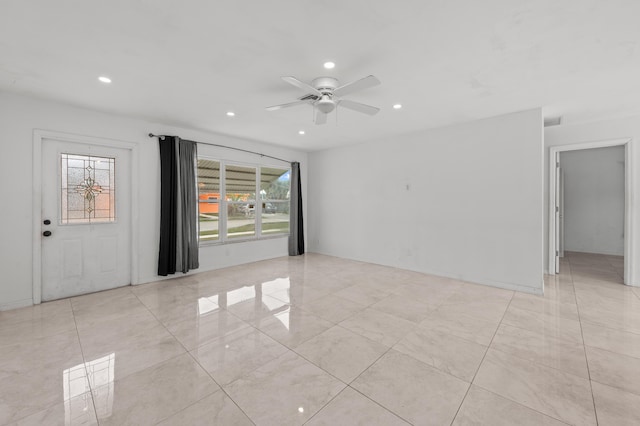 unfurnished room featuring ceiling fan