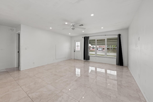 empty room featuring ceiling fan