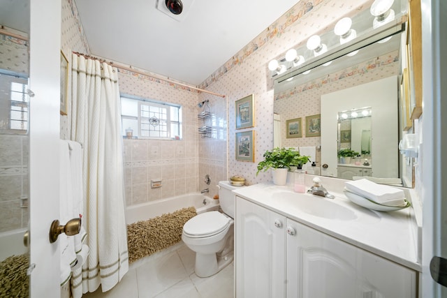 full bathroom featuring toilet, tile patterned flooring, shower / bathtub combination with curtain, and vanity