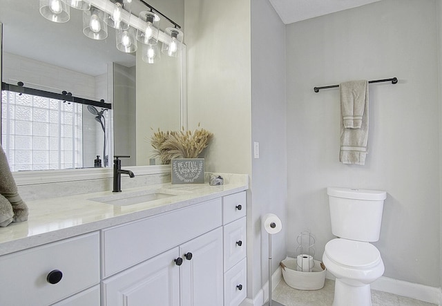 bathroom with vanity, toilet, tile patterned floors, and an enclosed shower