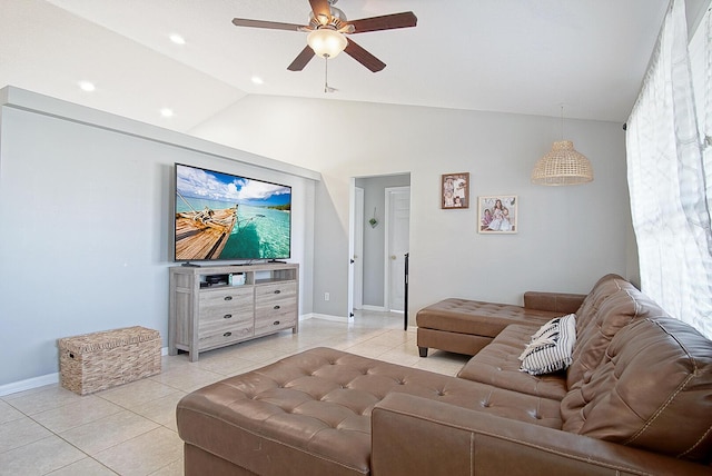 tiled living room featuring vaulted ceiling and ceiling fan