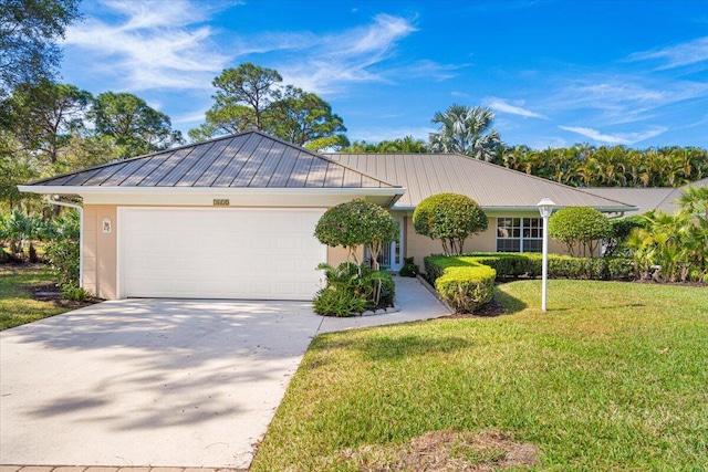 ranch-style house with metal roof, a standing seam roof, and driveway