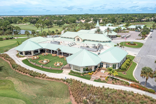 birds eye view of property with golf course view