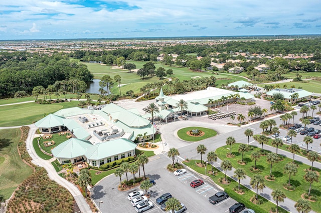 aerial view with a water view and golf course view