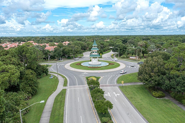 aerial view featuring a wooded view