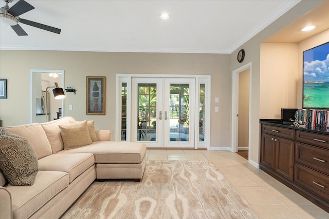 living room featuring ornamental molding, french doors, ceiling fan, and light tile patterned flooring