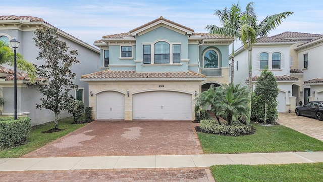 mediterranean / spanish-style house featuring a garage