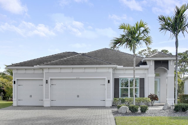 view of front of property with a garage