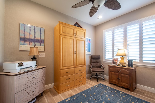 interior space featuring light wood-type flooring and ceiling fan