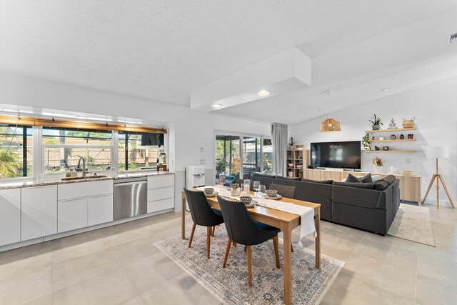 dining room with light tile patterned floors, recessed lighting, visible vents, vaulted ceiling, and a textured ceiling