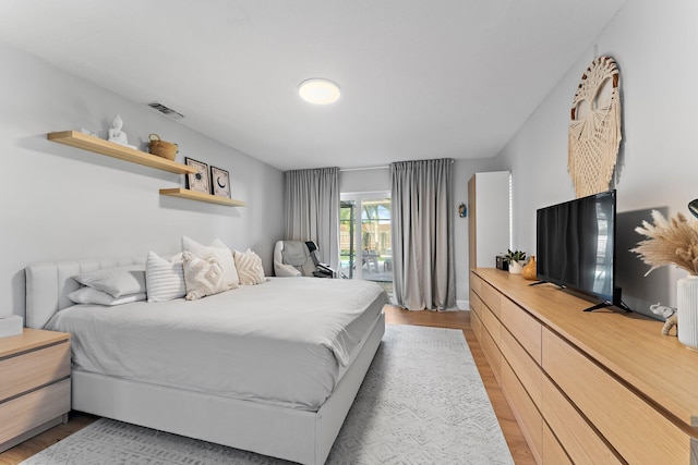 bedroom featuring light wood-type flooring