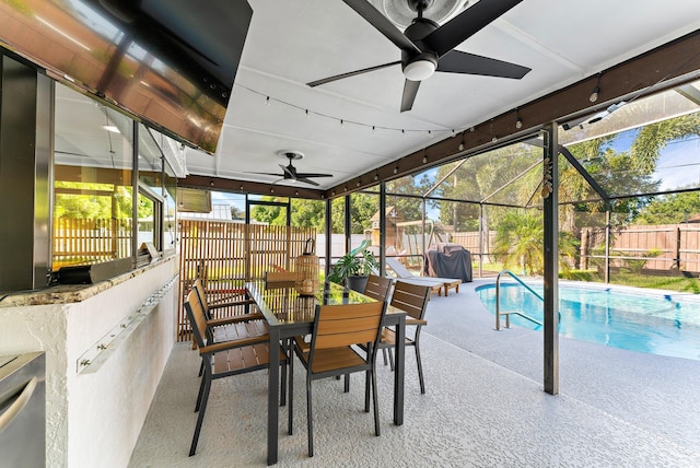 exterior space with a healthy amount of sunlight and ceiling fan