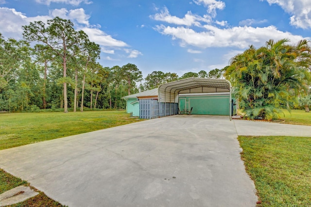 view of front facade featuring a front yard and a carport