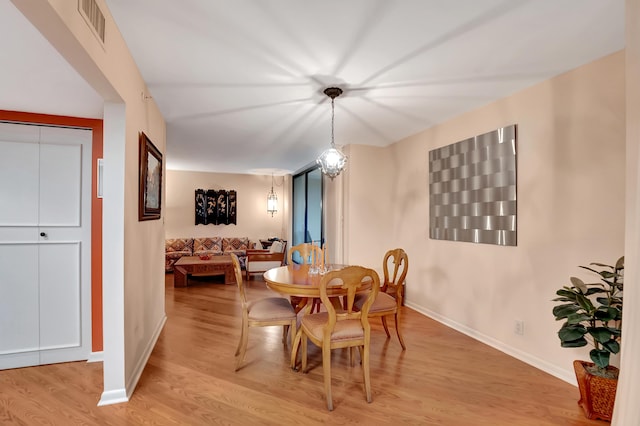 dining room with light hardwood / wood-style floors