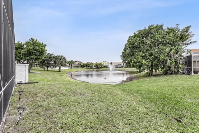 view of yard with a water view