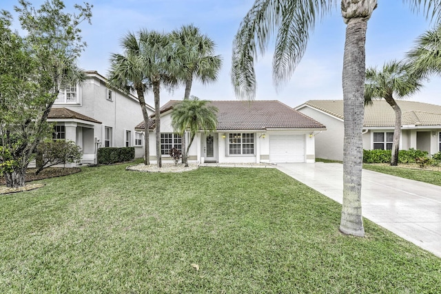 view of front facade featuring a garage and a front yard