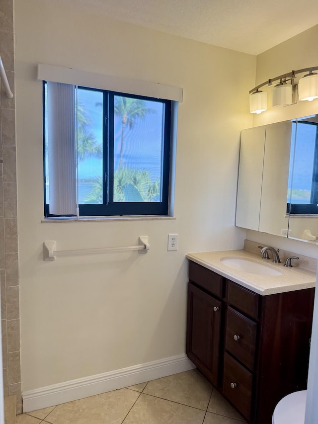 bathroom featuring vanity and tile patterned flooring