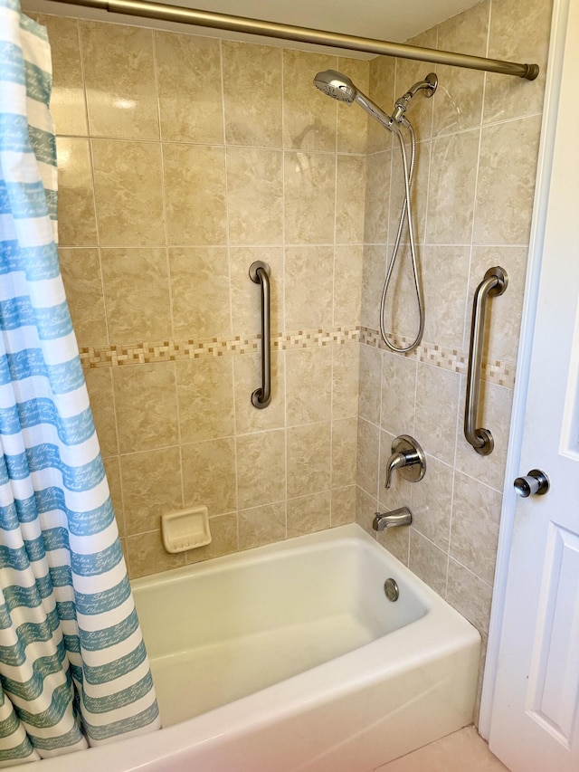 bathroom with tile patterned flooring and shower / bath combo with shower curtain