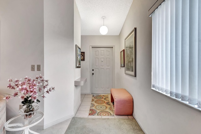 entryway featuring a textured ceiling