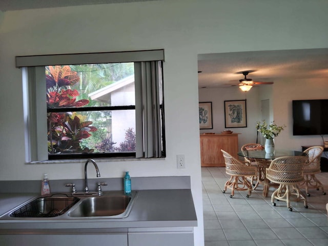 2430 NW 12th St, Delray Beach, FL 33445 - kitchen with a sink, light tile patterned flooring, and a ceiling fan