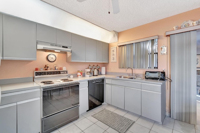 kitchen with light tile patterned flooring, dishwasher, sink, electric range, and a textured ceiling