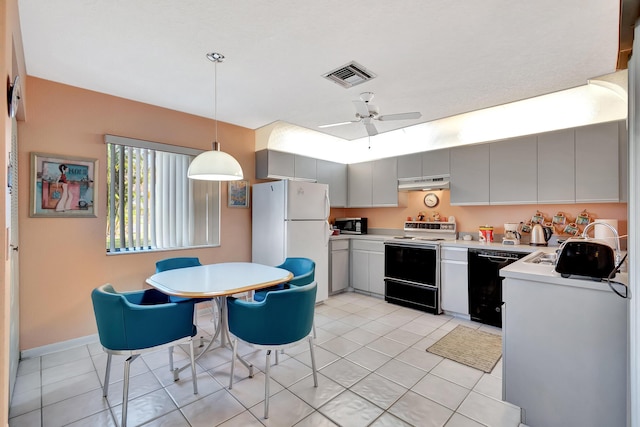 kitchen with gray cabinets, decorative light fixtures, light tile patterned floors, ceiling fan, and white appliances